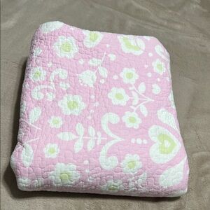 Pink and White Floral Quilt